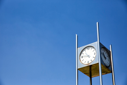 Clock tower against blue sky background - Chungjang Park in Goyang-si. Korea