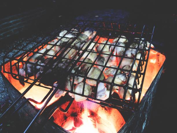 istock This is grilled straw mushroom on charcoal 673021572