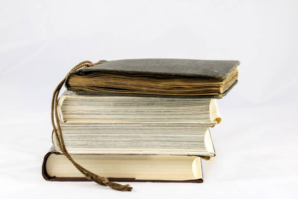 istock Old dusty book on white isolated background 673032984