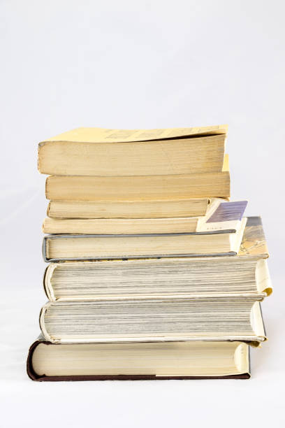 istock Old dusty book on white isolated background 673033398