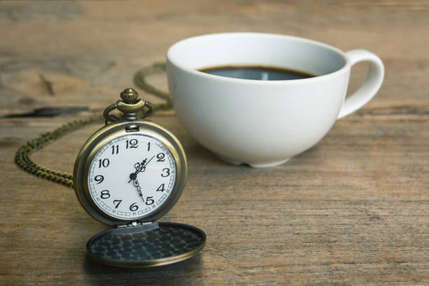 istock Pocket watch with coffee latte art, relax time 673046368