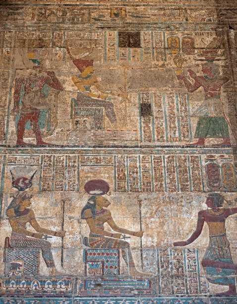 istock Hieroglyphic carvings on an ancient egyptian temple wall 673056632