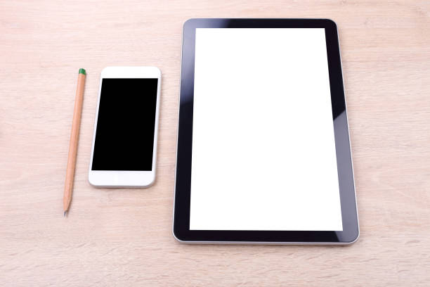 istock Blank screen smartphone and tablet on wooden background 673074290