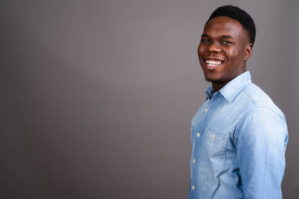 istock Studio shot of young African man against gray background 673081972