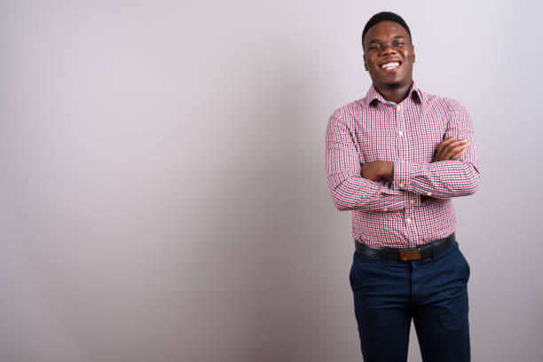istock Studio shot of young African man against gray background 673084792