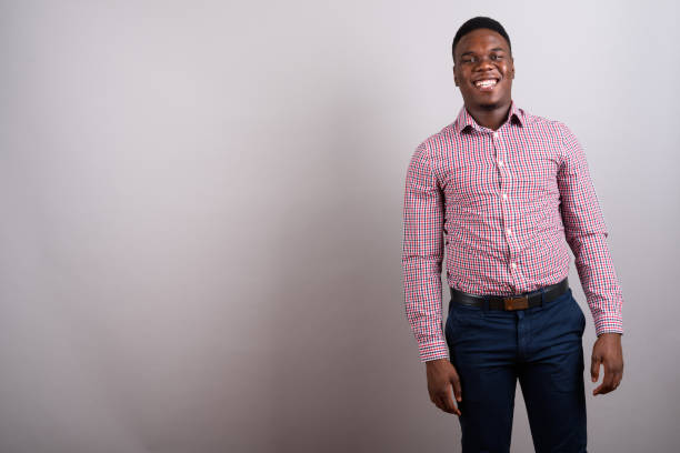 istock Studio shot of young African man against gray background 673084882