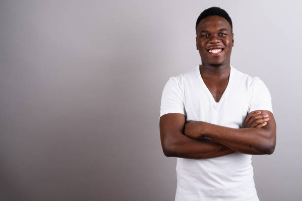 istock Studio shot of young African man against gray background 673096772