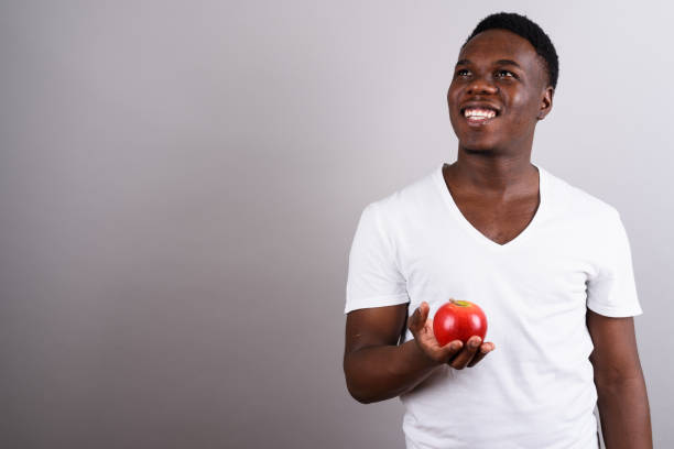 istock Studio shot of young African man against gray background 673097682