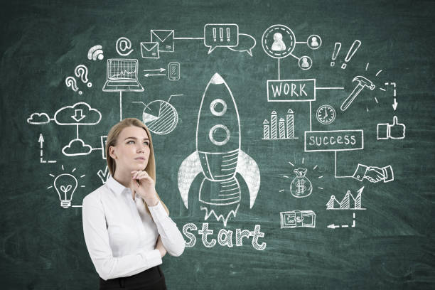 istock Thoughtful blond woman and rocket sketch 673098328