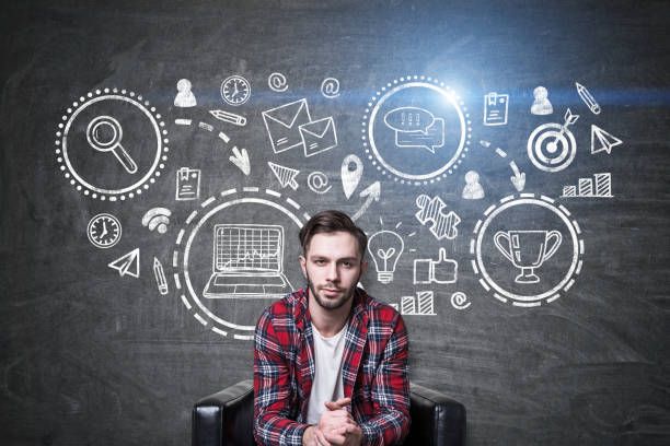 istock Man in armchair and business trophy 673107902