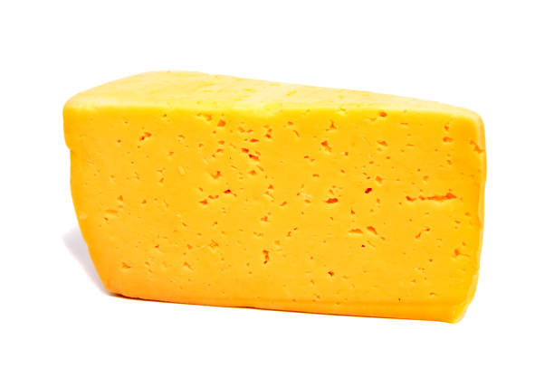 istock Cheese block isolated on white background cutout 673114914