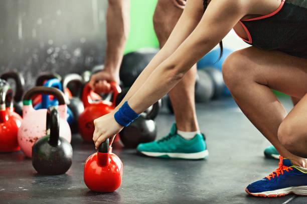 istock Love Couple Exercising in the Gym 673114972