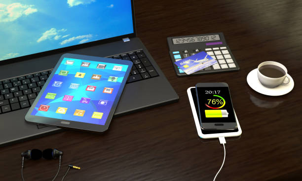 istock Laptop, Tablet PC, smart phone with wireless charger at the office workplace (3d illustration). 673123460