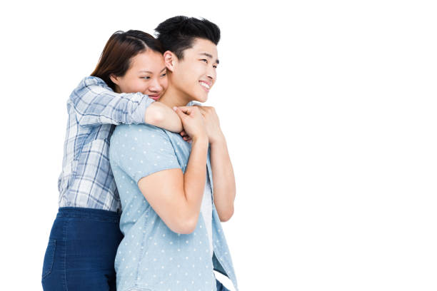istock Happy young couple embracing 673124518