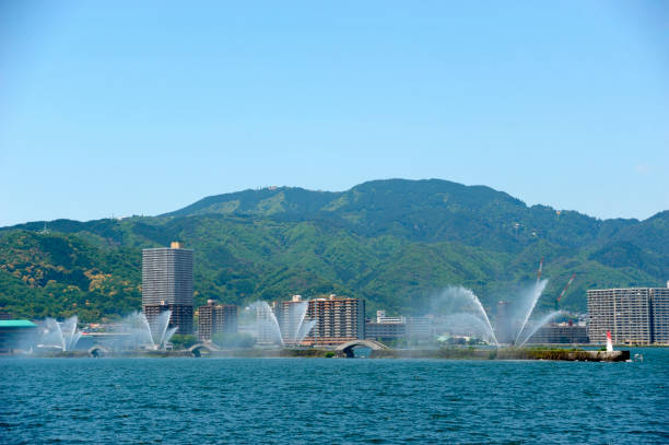 Otsu port of flowers fountains and Mt. Hiei Otsu port of flowers fountains and Mt. Hiei otsu city stock pictures, royalty-free photos & images