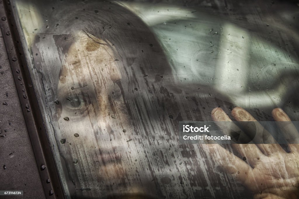 Woman abducted by car Woman abducted in car and mistreated, violence and crime Kidnapping Stock Photo