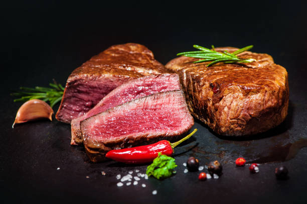 istock Grilled beef fillet steaks with spices 673152936