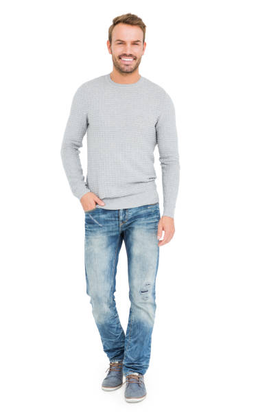 istock Young man standing with hands in pocket 673155462