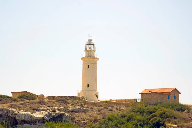 istock Lighthouse on beach in Paphos, Republic of Cyprus 673158638