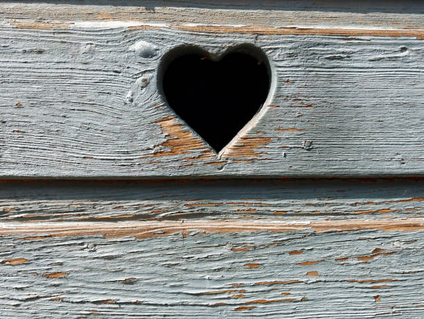 istock white wooden plank with heart 673165624