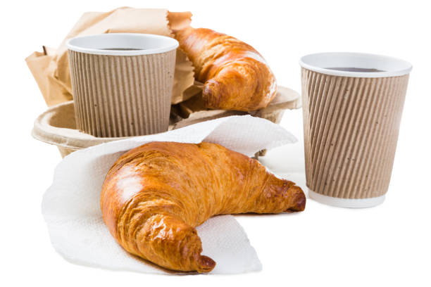 istock Croissant and coffee to go concept 673165698