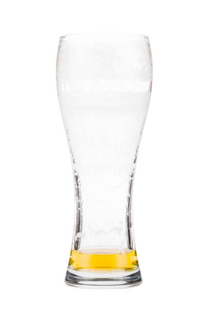 Beer glass almost empty stock photo