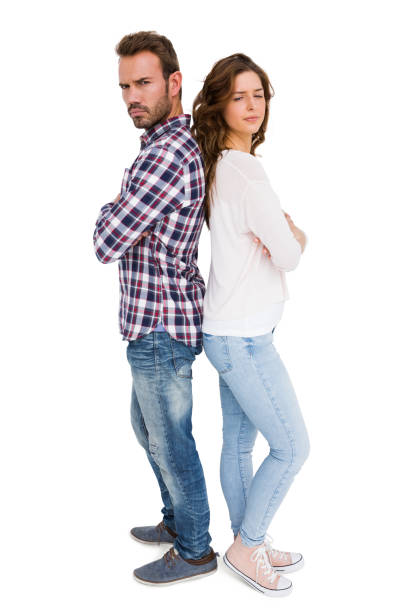 istock Depressed couple standing back to back 673176936