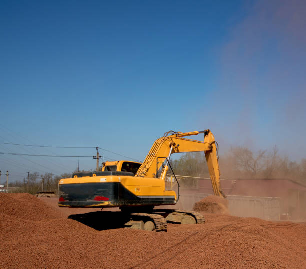 istock excavator delivers expanded clay 673180172