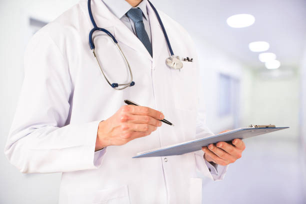 istock Doctor in front of a bright background 673180704
