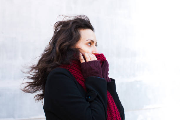 istock Woman dressed in winter clothes 673183302