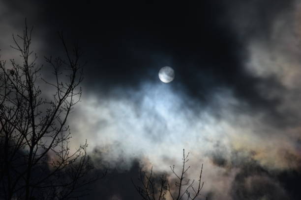istock Sunlight fights through the gloom of winter clouds 673183582