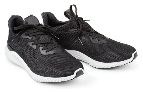 istock Running shoes, sneakers or trainers isolated on white 673187302