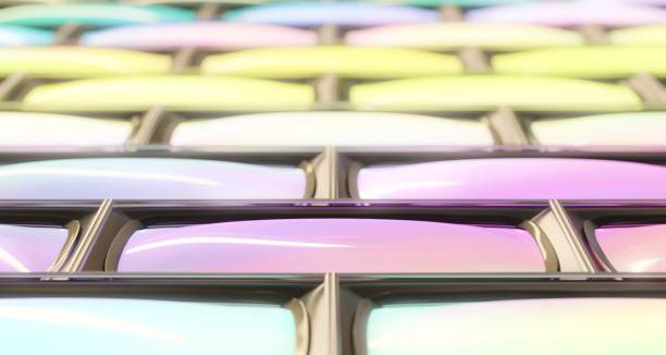 istock Tightly Packed Grid of Monitors Showing Bright Contiguous Abstract Pattern 673196480