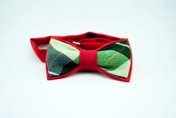 istock Stylish and well-designed red-green bow-tie on a white background; isolated 673196940