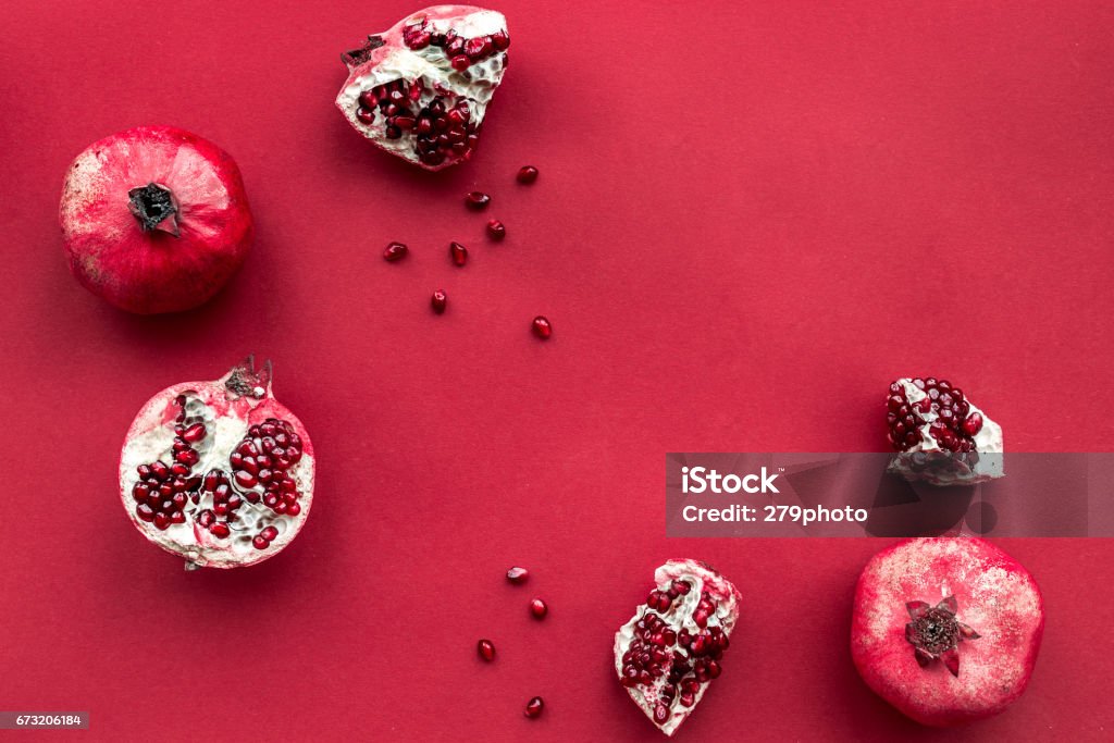 red set with pomegranate for restaurant menu top view mockup red set with cut pomegranate for restaurant menu top view mockup Pomegranate Stock Photo