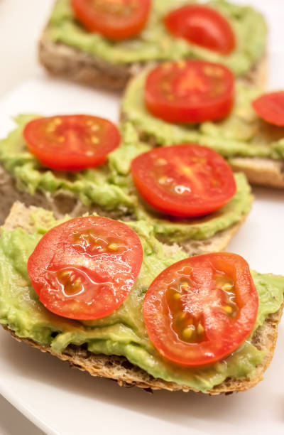 istock healthy sandwiches with guacamole and tomato 673206278