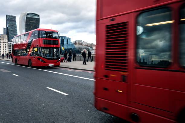 istock Red typical London bus on London Bridge 673209140