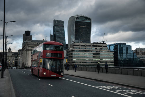 istock Red typical London bus on London Bridge 673209162