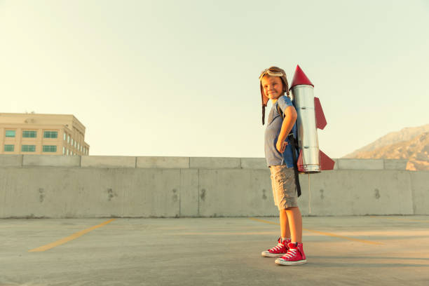 istock Young Boy Dreams of being an Astronaut 673209536