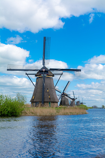 Windmills on windy day in spring in Kinderdijk the Netherlands