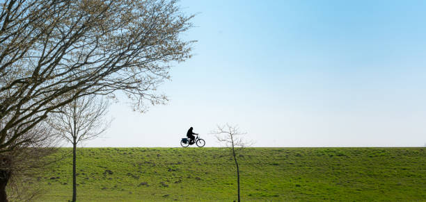older man or woman on e-bike