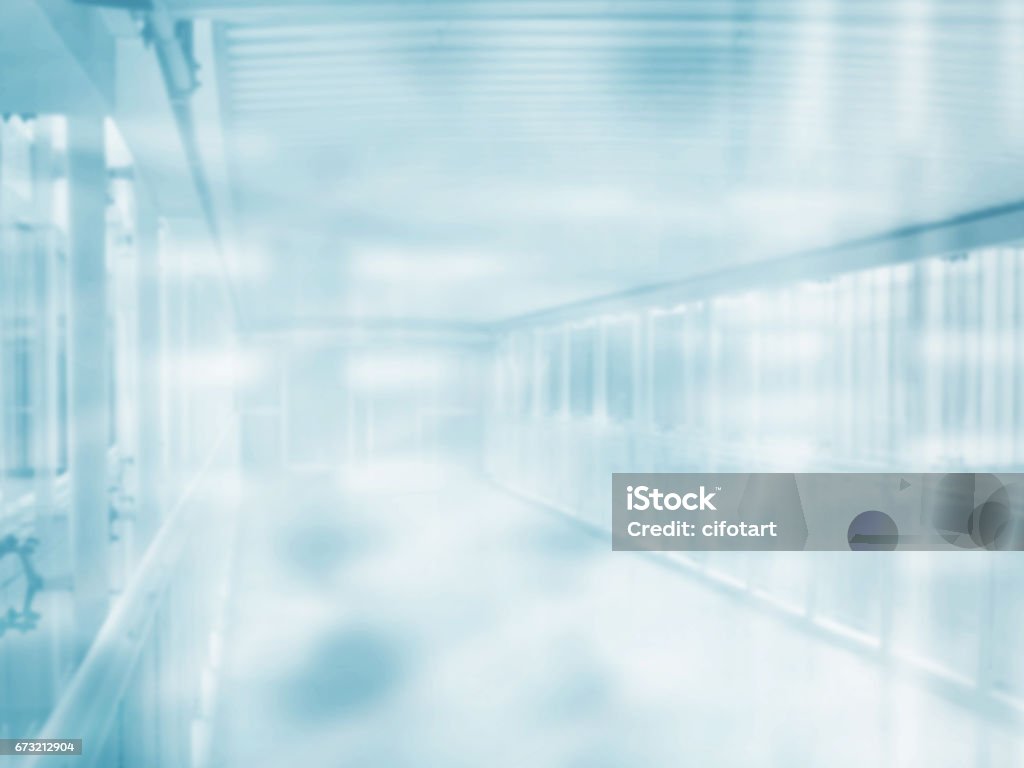 Medical blurred background Medical blurred background, empty hospital corridor in neon blue Backgrounds Stock Photo