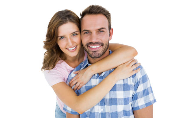 istock Happy young couple embracing 673215578