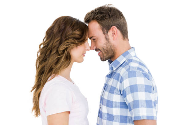 istock Happy young couple rubbing nose 673215604