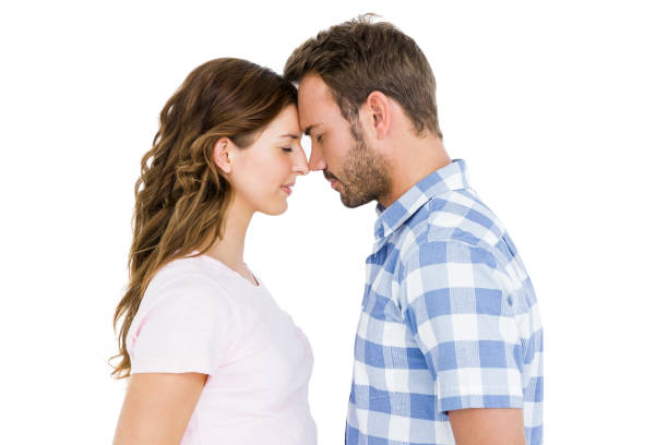 istock Young couple rubbing nose 673215630
