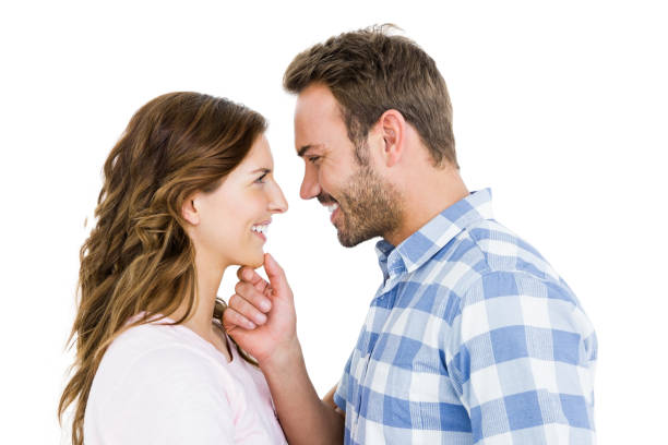 istock Happy young couple looking at each other and smiling 673215704
