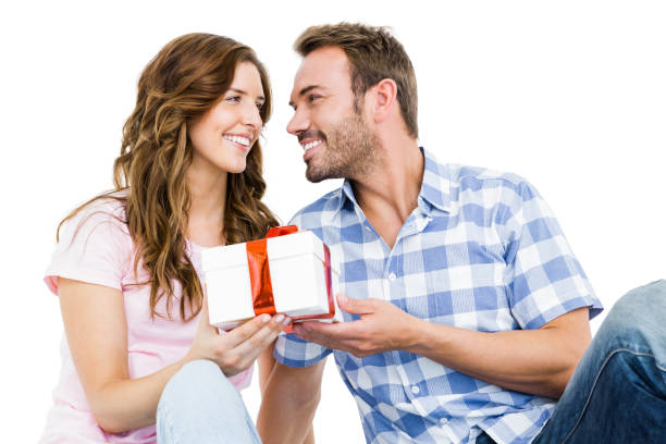 istock Man giving a gift to his woman 673216554