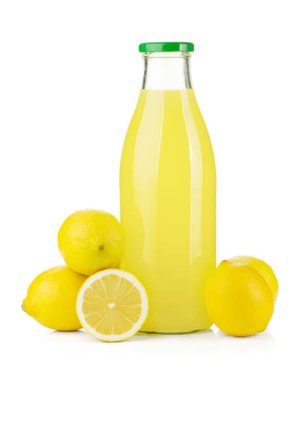 istock Bottle of lemon juice and fresh lemons 673217070