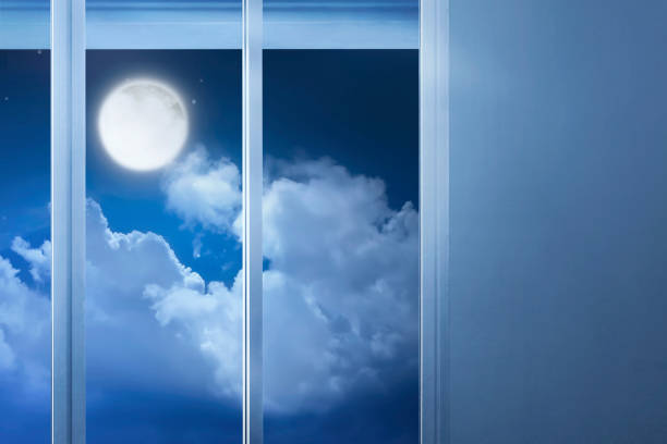 istock Window glass in the empty room with moonlight 673233158