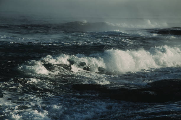 istock Big stormy ocean wave. Blue water background 673234554